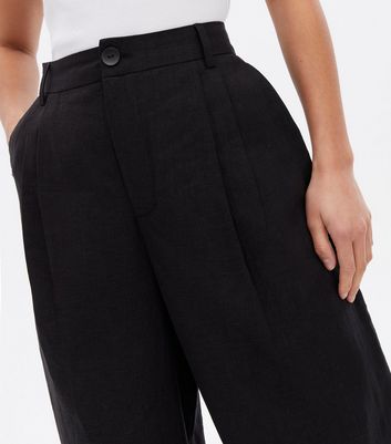 Click to view product details and reviews for Petite Black Linen Look Wide Leg Trousers New Look.