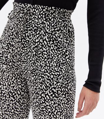 Click to view product details and reviews for Black Animal Print Tie Waist Joggers New Look.