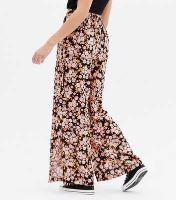 Click to view product details and reviews for Black Retro Floral Split Flared Trousers New Look.