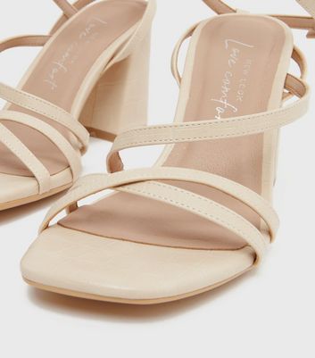 off white flared block heel sandals