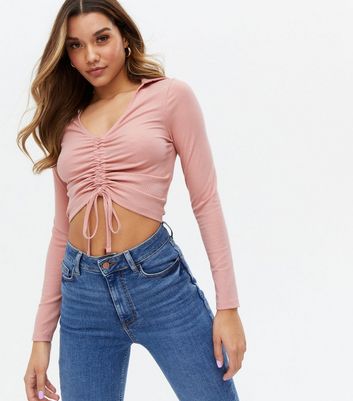 Click to view product details and reviews for Pale Pink Ruched Collared Long Sleeve Top New Look.