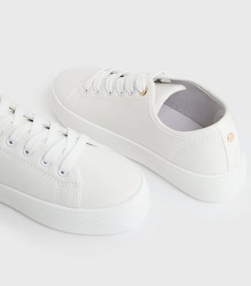 ladies white canvas lace up pumps