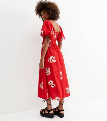 Click to view product details and reviews for Red Floral Shirred Puff Sleeve Midi Dress New Look.