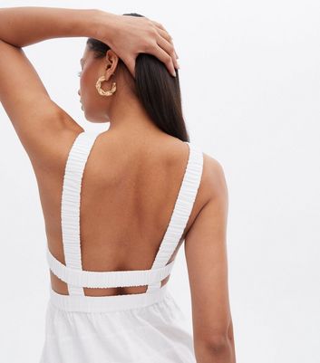 Click to view product details and reviews for White Cut Out Cross Back Midi Dress New Look.