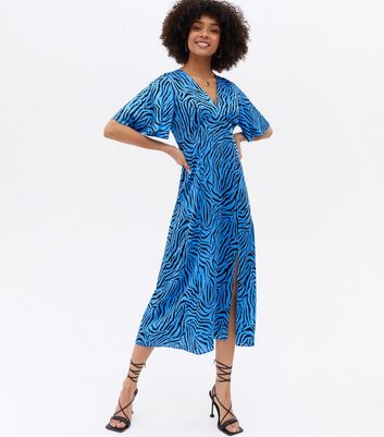 Click to view product details and reviews for Blue Tiger Print Satin Midi Dress New Look.