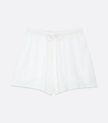 Click to view product details and reviews for White Crinkle Tie Waist Beach Shorts New Look.