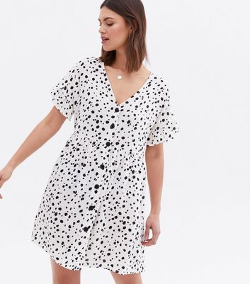 Click to view product details and reviews for White Spot Button Front Mini Smock Dress New Look.