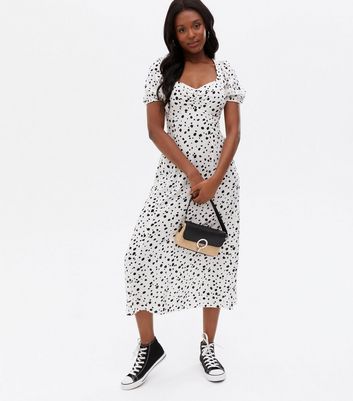 Click to view product details and reviews for Off White Spot Ruched Midi Dress New Look.