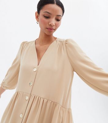 Click to view product details and reviews for Stone Button Front Mini Smock Dress New Look.