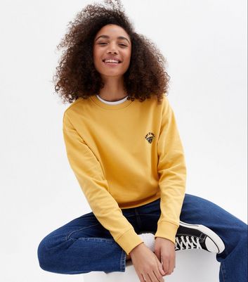 Click to view product details and reviews for Mustard Let It Bee Embroidered Sweatshirt New Look.