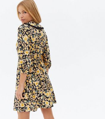 Click to view product details and reviews for Mustard Floral Frill Collar Mini Tea Dress New Look.