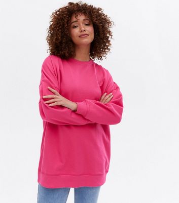 Pink oversize sweatshirt sale