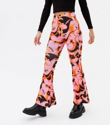 Click to view product details and reviews for Petite Pink Floral Ribbed Flared Trousers New Look.