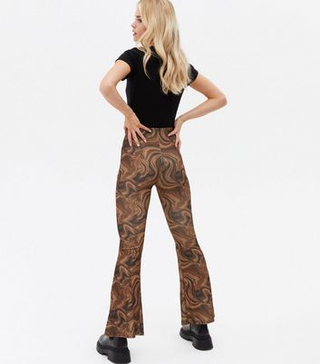 Click to view product details and reviews for Petite Brown Marble Ribbed Flared Trousers New Look.