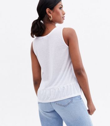Click to view product details and reviews for White Peplum Vest New Look.