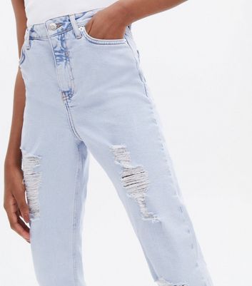 jeans with a lot of rips