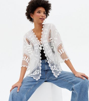 Click to view product details and reviews for White Crochet Tie Front Kimono New Look.