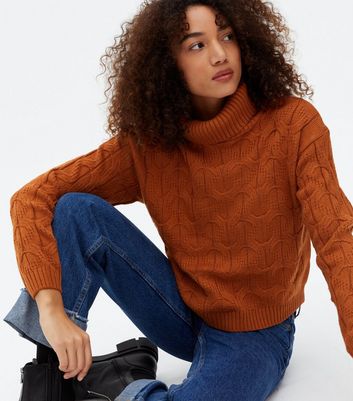 Click to view product details and reviews for Blue Vanilla Tan Cable Knit Roll Neck Crop Jumper New Look.