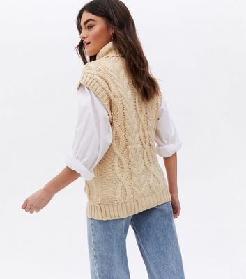 Click to view product details and reviews for Blue Vanilla Stone Cable Knit Roll Neck Vest Jumper New Look.