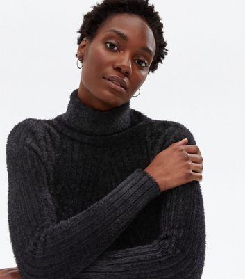 black ribbed polo neck jumper