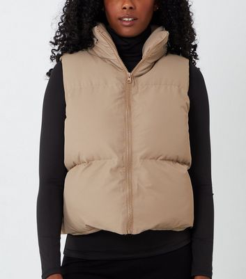 Click to view product details and reviews for Blue Vanilla Camel Puffer Hooded Zip Gilet New Look.