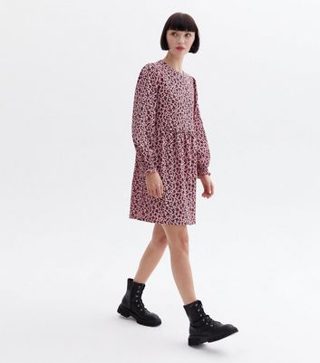 Click to view product details and reviews for Pink Ditsy Floral Crinkle Jersey Mini Smock Dress New Look.