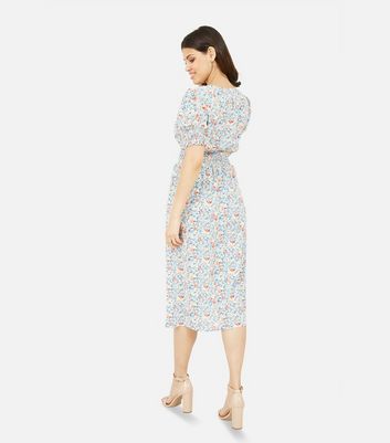 Click to view product details and reviews for Mela Pale Blue Ditsy Floral Shirred Midi Dress New Look.