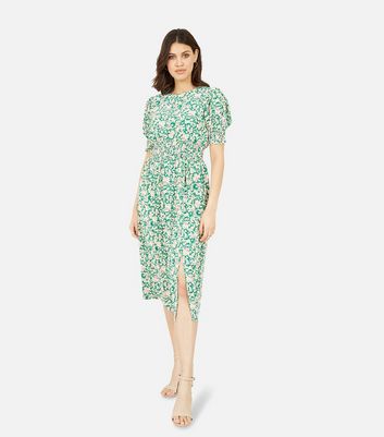 Click to view product details and reviews for Mela Green Ditsy Floral Shirred Midi Dress New Look.