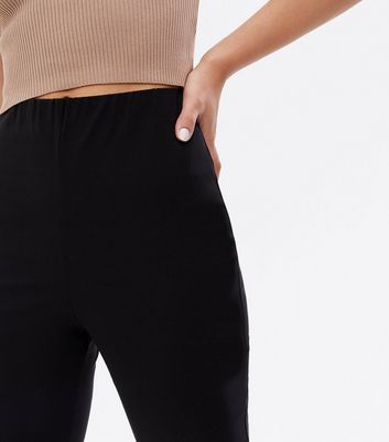 Click to view product details and reviews for Black High Waist Flared Trousers New Look.