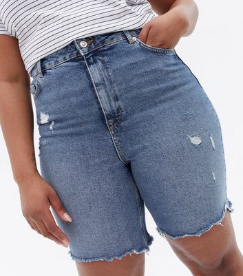 Knee high hot sale ripped shorts