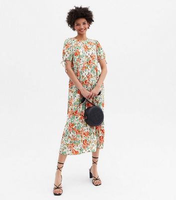 Click to view product details and reviews for Green Floral Tiered Midi Smock Dress New Look.