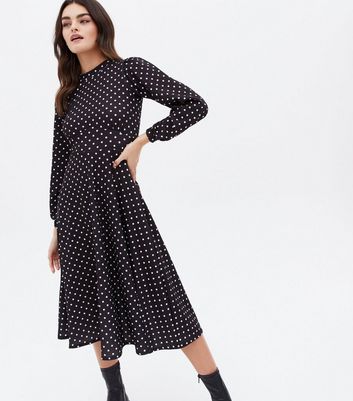 Click to view product details and reviews for Missfiga Black Polka Dot High Neck Midi Skater Dress New Look.