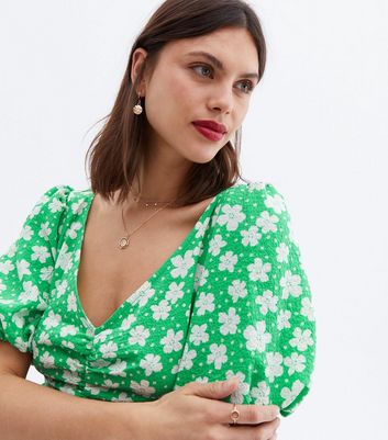 Click to view product details and reviews for Green Floral Ruched Tie Back Puff Sleeve Midi Dress New Look.