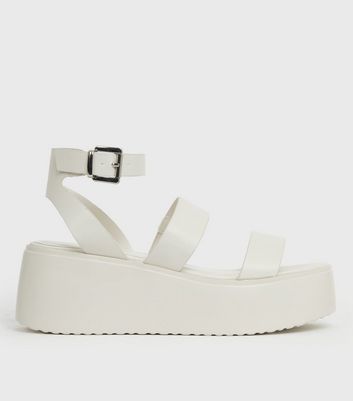 white chunky flatform sandals