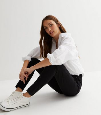 Black skinny jeans white on sale converse