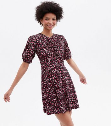 Click to view product details and reviews for Pink Floral Crinkle Jersey Ruched Mini Dress New Look.