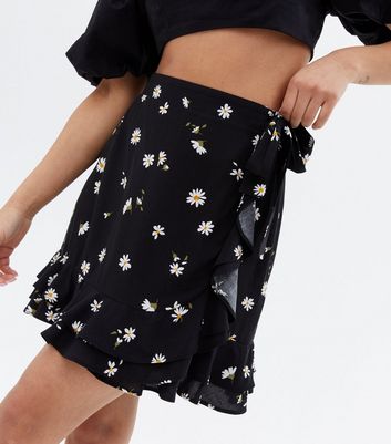 Click to view product details and reviews for Petite Black Daisy Frill Mini Wrap Skirt New Look.