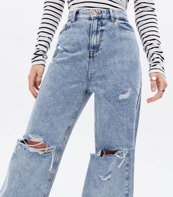 Click to view product details and reviews for Petite Pale Blue Ripped High Waist Wide Leg Dad Jeans New Look.