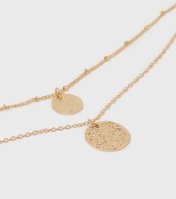 Layered gold disc on sale necklace