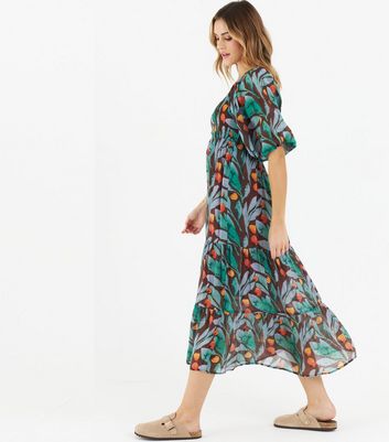 Click to view product details and reviews for Zibi London Dark Green Leaf Shirred Tiered Midi Dress New Look.