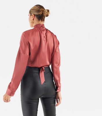 Click to view product details and reviews for Zibi London Rose Gold Satin High Neck Crop Blouse New Look.