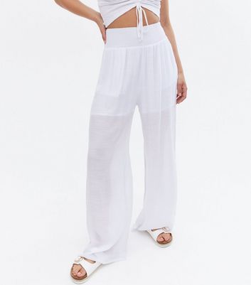 Click to view product details and reviews for Blue Vanilla White Shirred High Waist Wide Leg Trousers New Look.