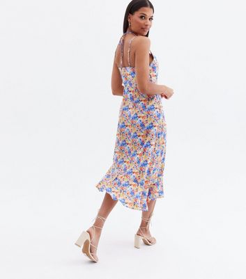 Click to view product details and reviews for Blue Vanilla Blue Floral Midi Slip Halter Dress New Look.
