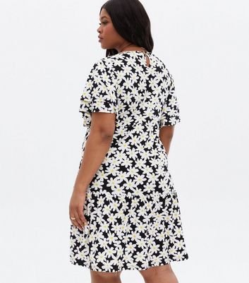 Click to view product details and reviews for Blue Vanilla Curves Black Daisy Frill Sleeve Smock Dress New Look.