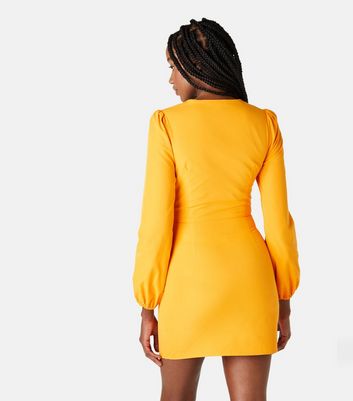 Click to view product details and reviews for Urban Bliss Bright Orange Cut Out Mini Shirt Dress New Look.