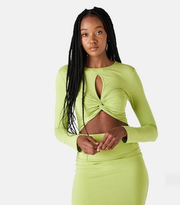 Click to view product details and reviews for Urban Bliss Light Green Twist Cut Out Midi Dress New Look.