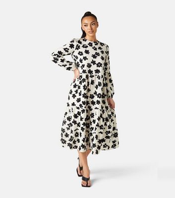 Click to view product details and reviews for Urban Bliss White Floral Midi Smock Dress New Look.