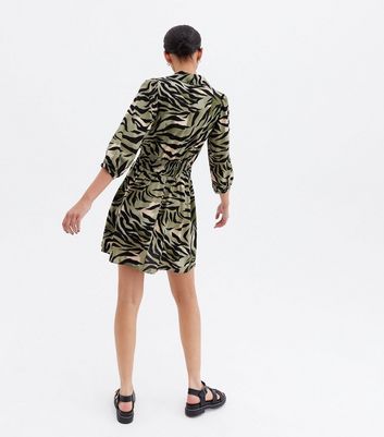 Click to view product details and reviews for Green Zebra Print Shirred Collared Mini Dress New Look.