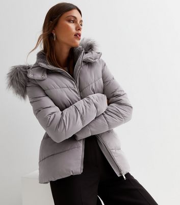 fur trimmed puffer vest