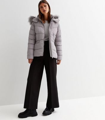 dark grey puffer coat with fur hood